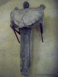 Angel statue holding sundial